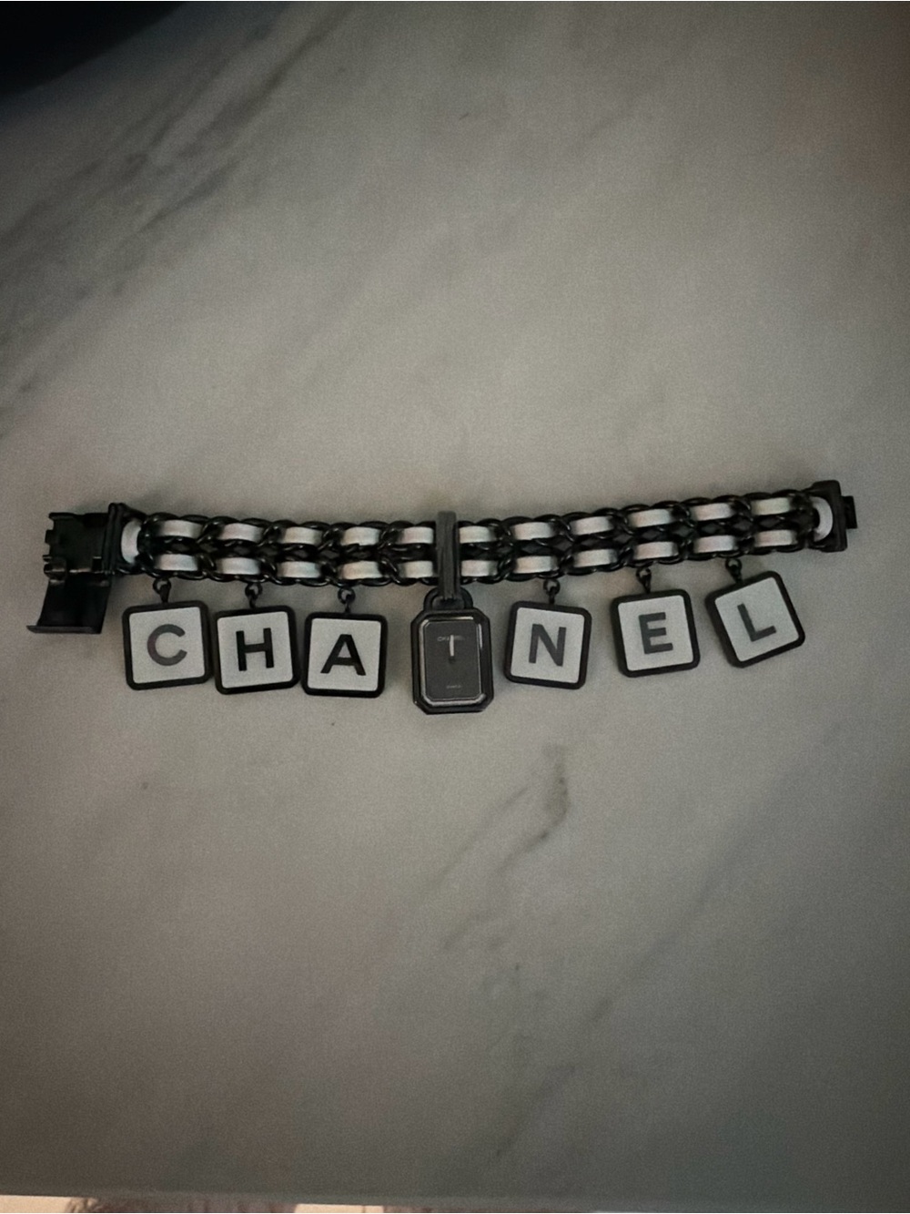 Authentic game piece. CHANEL Black and White Chain Charm Bracelet